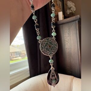 Elegant Silver and Green Pendant Necklace and Earrings